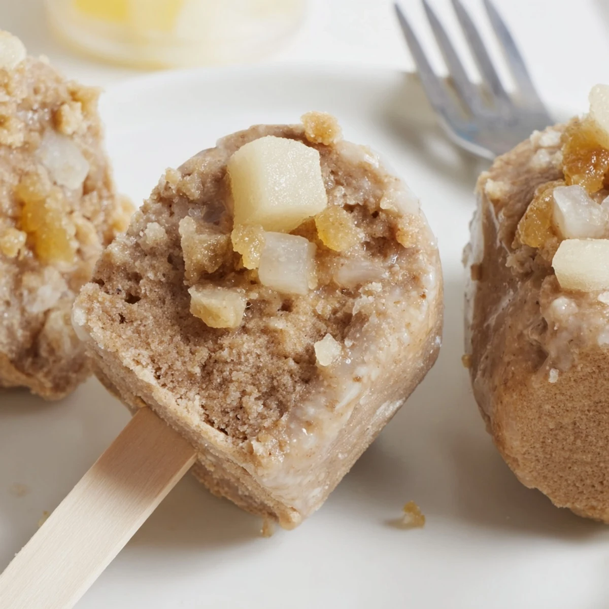 Cream Soda Maple Ginger Biscuit Muffin Pops drizzled with syrup, perfect for dessert lovers.