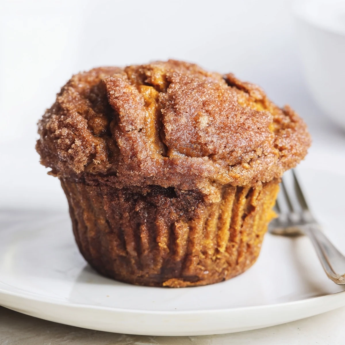 Warm cinnamon sugar maple bourbon muffins perfect for brunch or a cozy breakfast.
