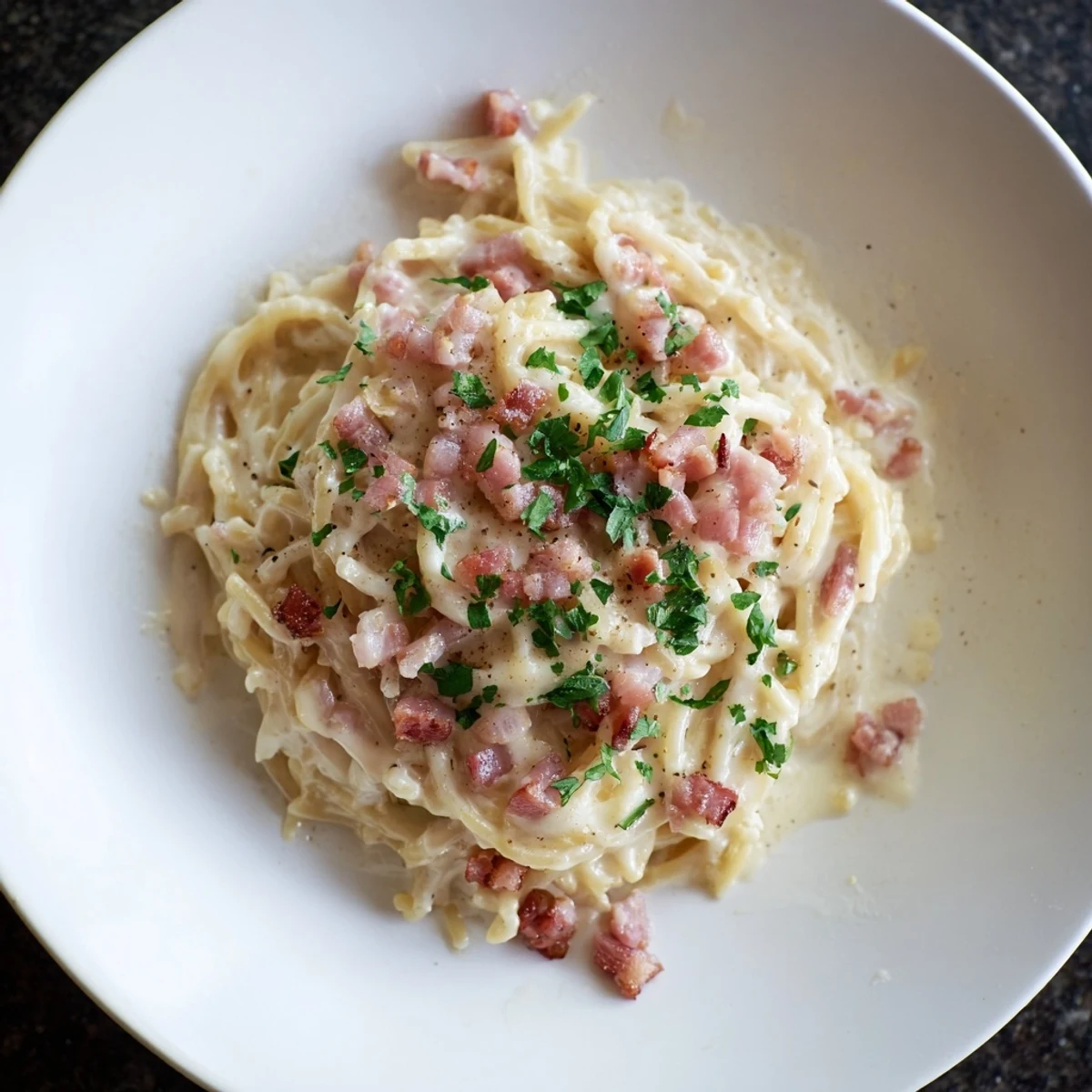 Instant Pot Carbonara Ramen: A steaming bowl of creamy ramen with crispy bacon and Parmesan.
