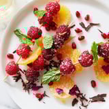 A close-up of elegantly arranged Baisers de Minuit, sparkling with edible glitter, perfect for cocktails.