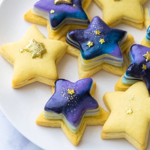 Stargazers Dessert Platter brimming with lemon shortbread stars, galaxy mousse, and chocolate comet truffles.