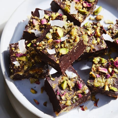 Luxurious chocolate bar inspired creations featuring spiced date caramel and crunchy layers.  