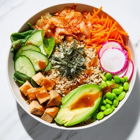 Delicious fermented vegetable bowl topped with creamy avocado and crunchy radishes.  