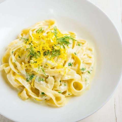 Warm and comforting Creamy Dill Pasta, showcasing the silky smooth texture of the sauce.