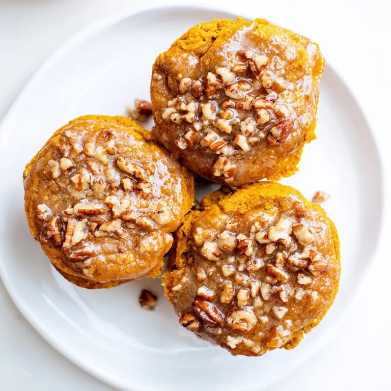 Decadent Maple Pecan Sweet Potato Muffin Tops, warm and moist, ideal for snacking.  